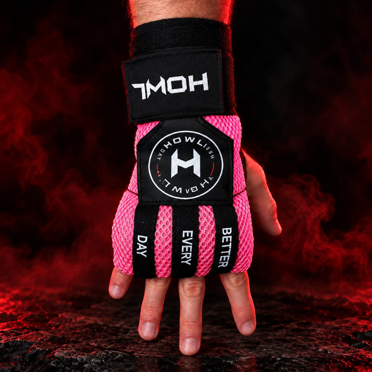 Pink HOWL Quick Wraps worn on hand showing HOWL branding